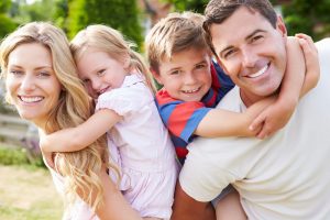 A family's smiles are protected thanks to fluoride treatments
